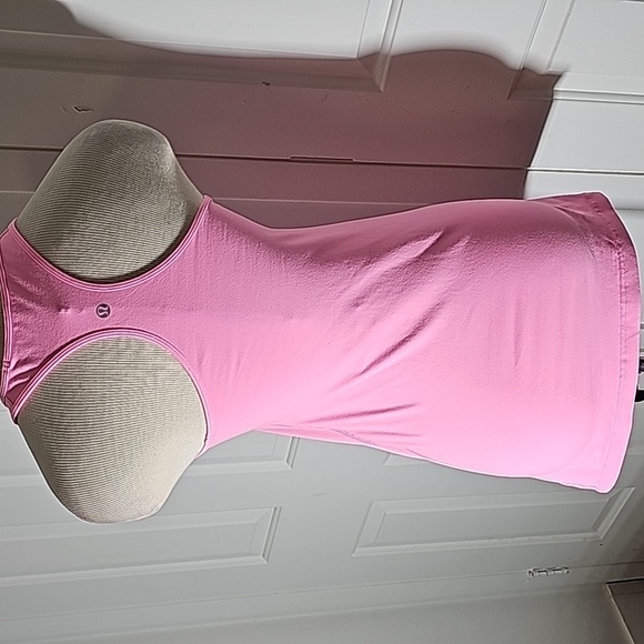 Lululemon pink razor back tank top.‎ Very good used condition. Size 8. - Picture 5 of 7